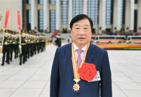 谭旭光被授予“全国优秀共产党员”称号