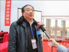 总裁判长谭衡鸣接受记者采访